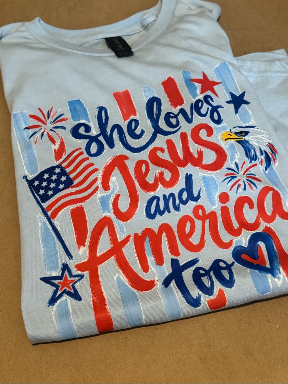 Patriotic 'She Loves Jesus and America Too' Womens Tee - Light Blue